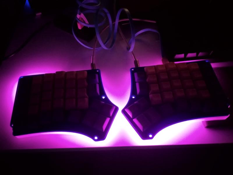 Preview of Redox keyboard with RGB lights turned on in a dark